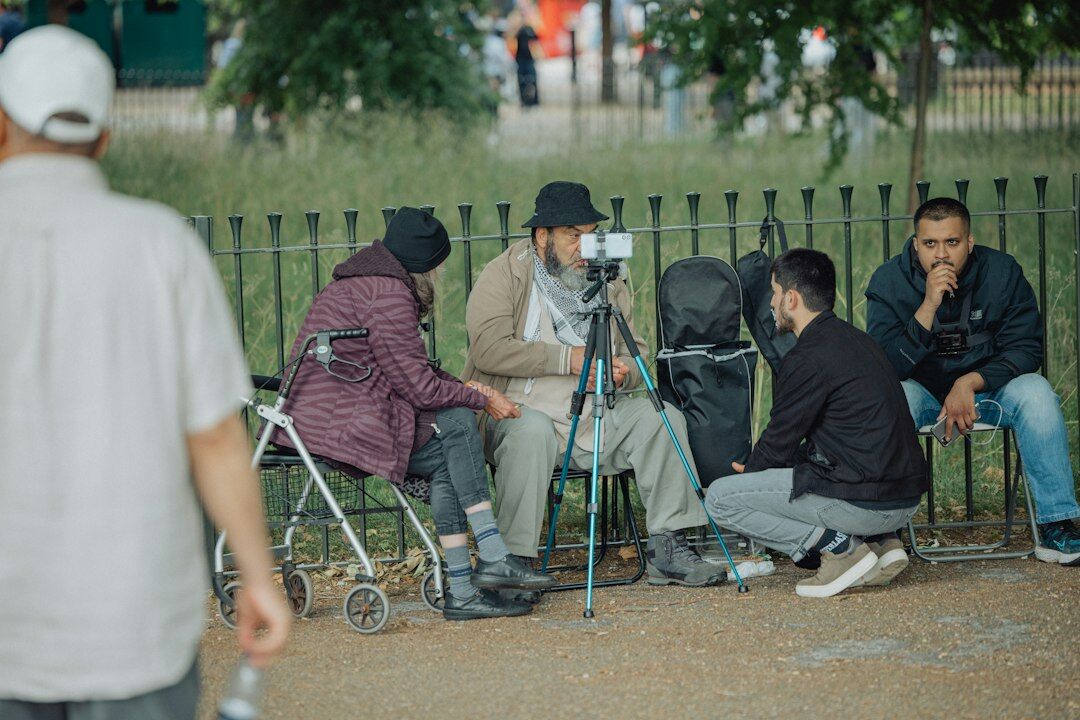 photographer interviewing elderly woman