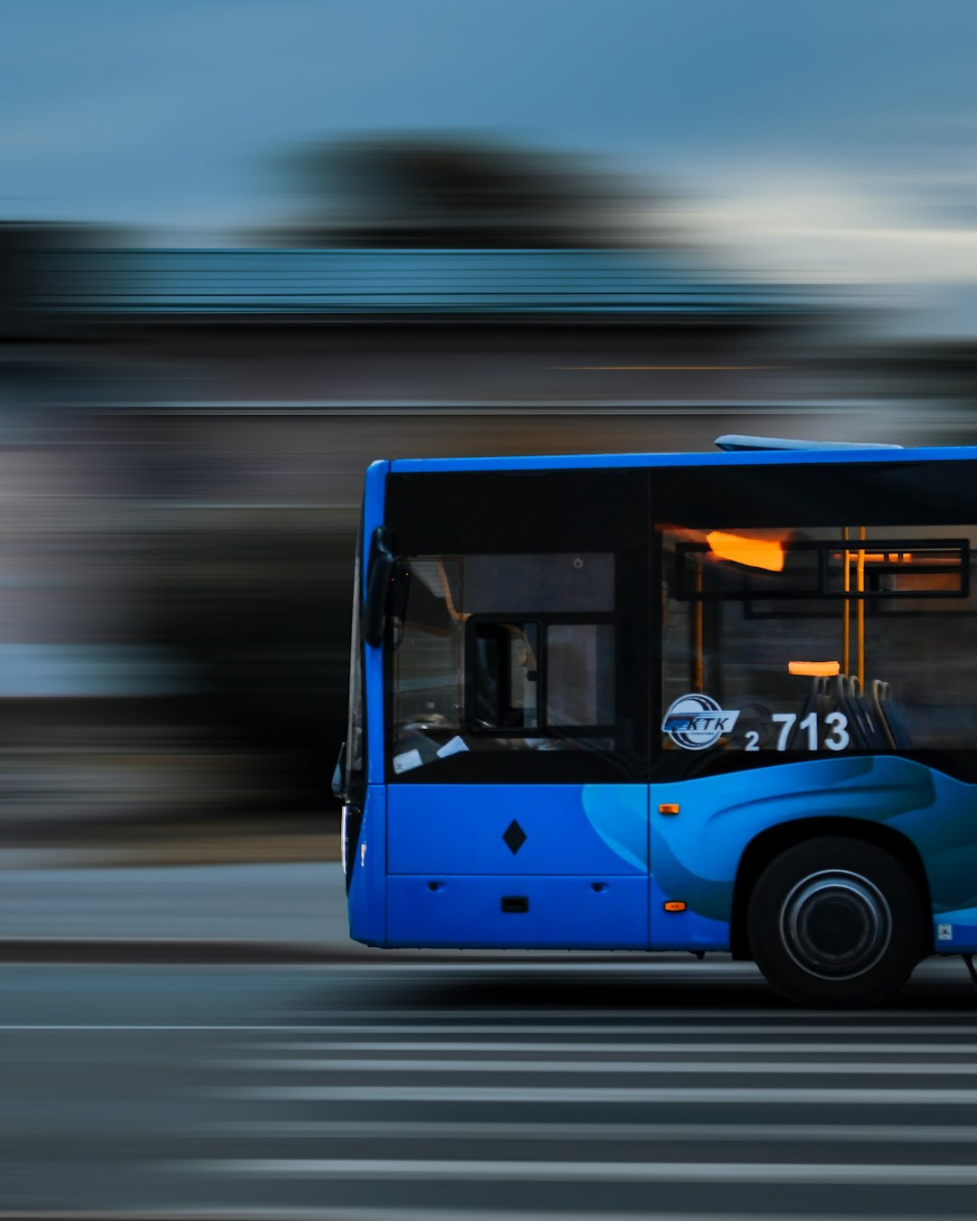 Public bus driving through a city street