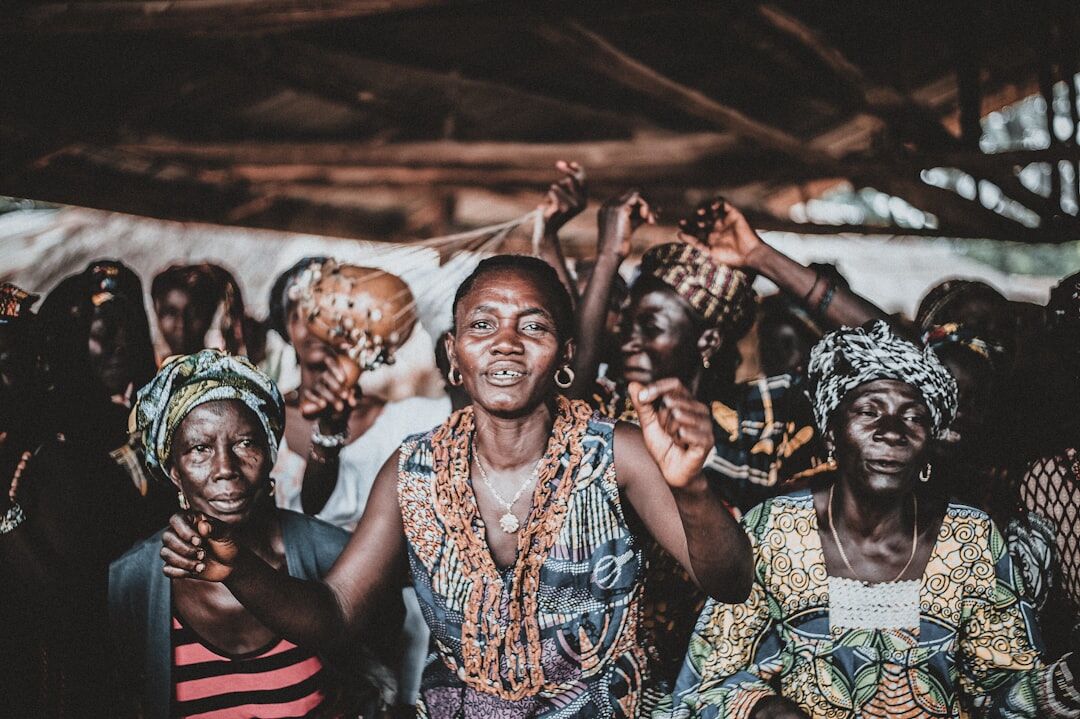 group of villagers smiling